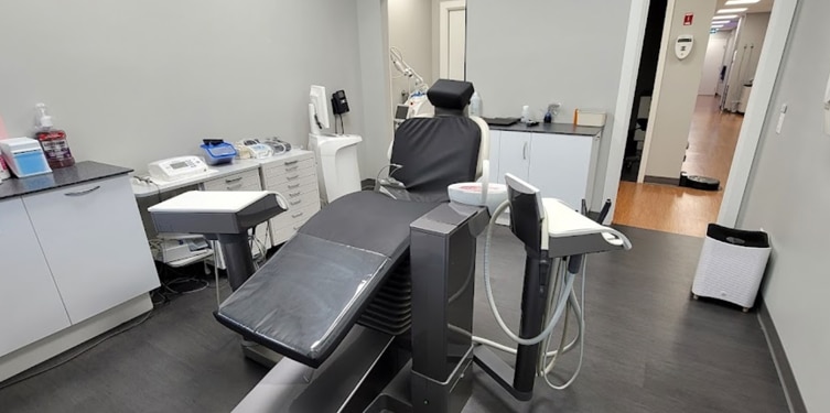 a dental chair surrounded by dental technology